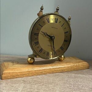 Gold desktop Clock in working condition